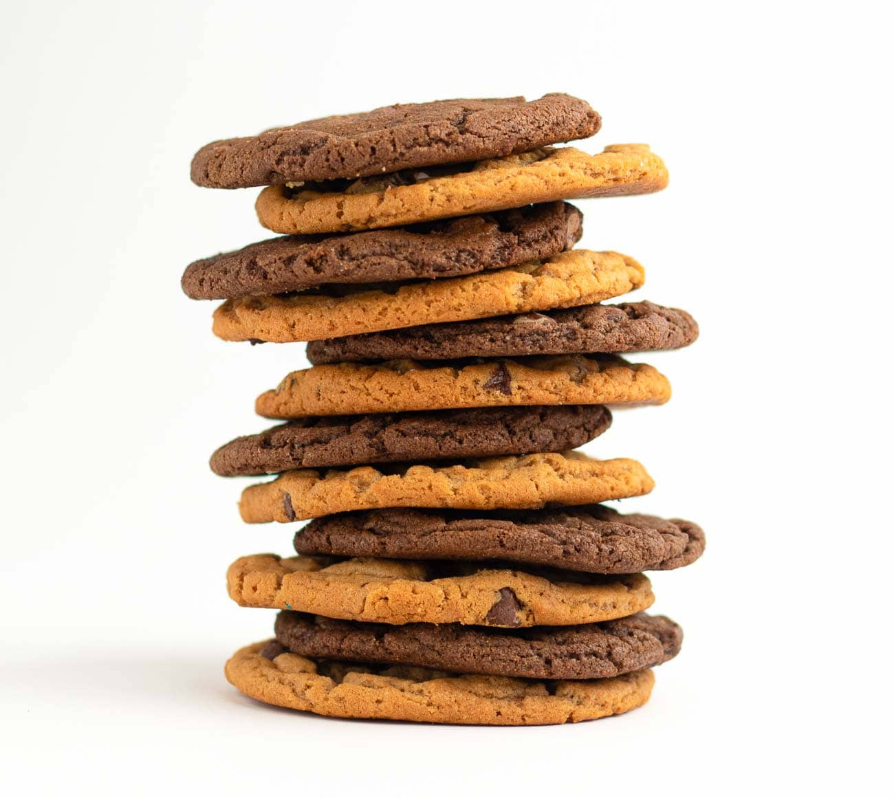 Picture of a dozen of Double fudge and Original chocolate chip cookies alternately stacked on top of each other