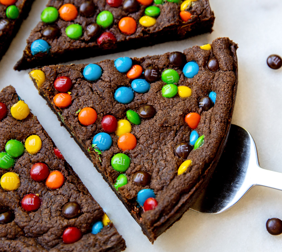 Picture of slices of Deep dish brownie with M&Ms