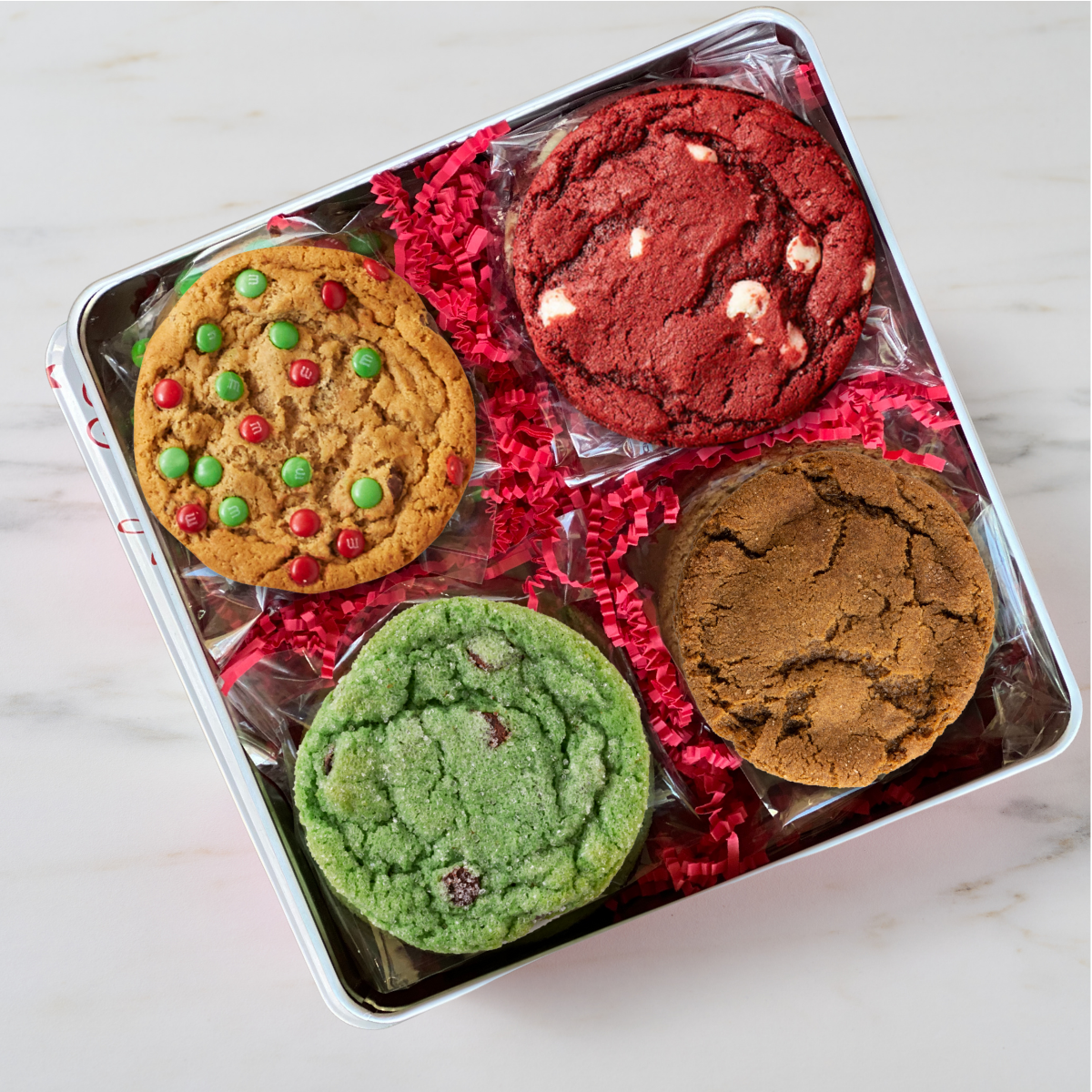 Assorted cookies in holiday gift tin